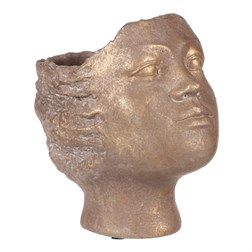 Obal na květiny betonový, tvar hlavy, barva měděná.