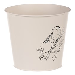 Obal kovový, krémová barva s ptáčkem.