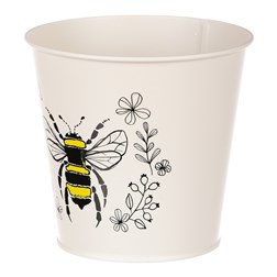 Obal kovový, krémová barva s včelkou.