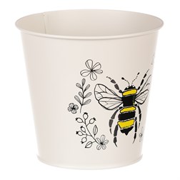 Obal kovový, krémová barva s včelkou.