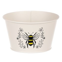 Obal kovový, krémová barva s včelkou.