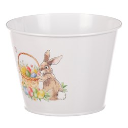 Kovový obal na květiny s velikonočním designem.