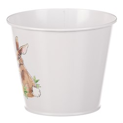 Kovový obal na květiny s velikonočním designem.